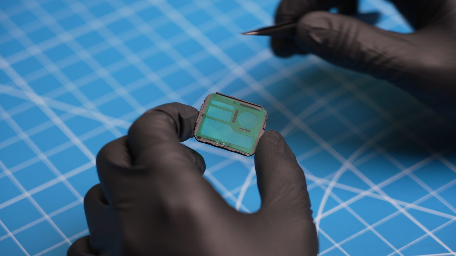 Applying the green gel filter to the back of the Casio AE-1200 faceplate